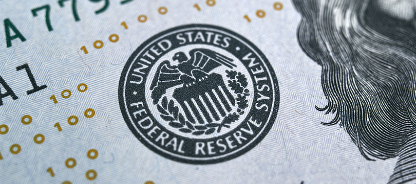 Federal Reserve seal printed on a US dollar banknote